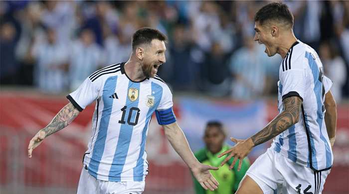 Sep 27, 2022; Harrison, New Jersey, USA; Argentina forward Lionel Messi (10) celebrates his goal Argentina goalkeeper Andre Blake (1) with forward Angel Correa (16) during the second half at Red Bull Arena.